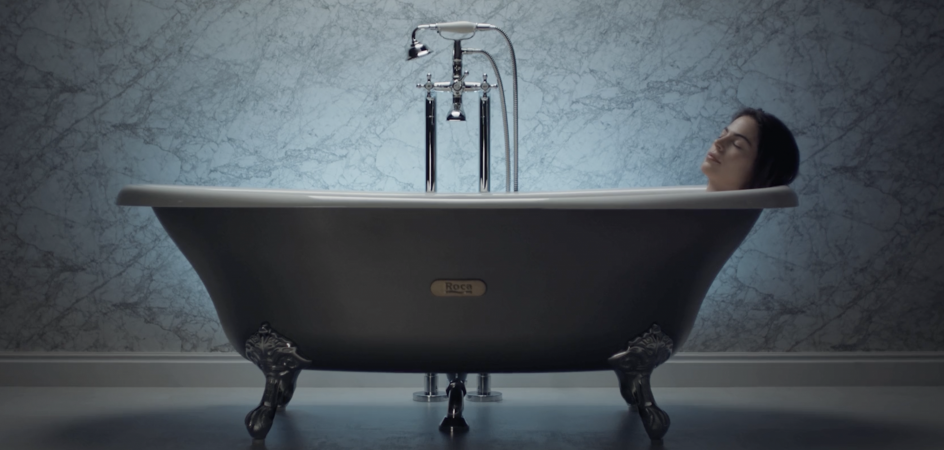 Relaxed woman on a Roca bathtub